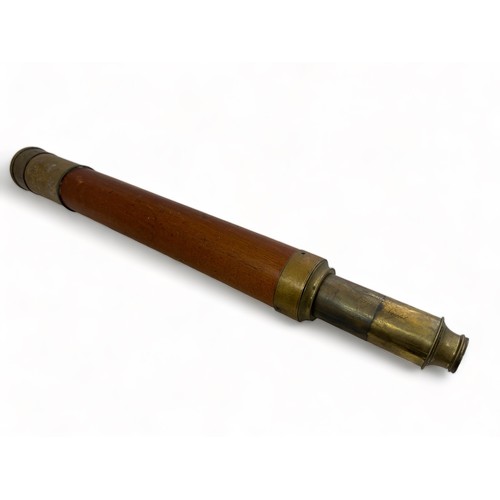 302 - A single draw Day or Night brass telescope by Jones of London. Approx 86cm when extended.