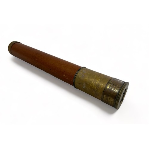 302 - A single draw Day or Night brass telescope by Jones of London. Approx 86cm when extended.