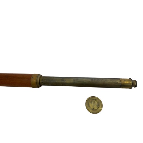 302 - A single draw Day or Night brass telescope by Jones of London. Approx 86cm when extended.