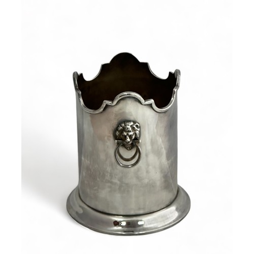 209 - A silver plated bottle holder with lion's head handles by Stevenson & Law. Height 16.7cm.