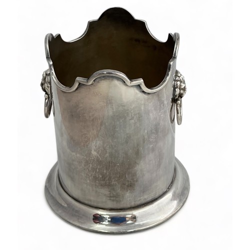 209 - A silver plated bottle holder with lion's head handles by Stevenson & Law. Height 16.7cm.