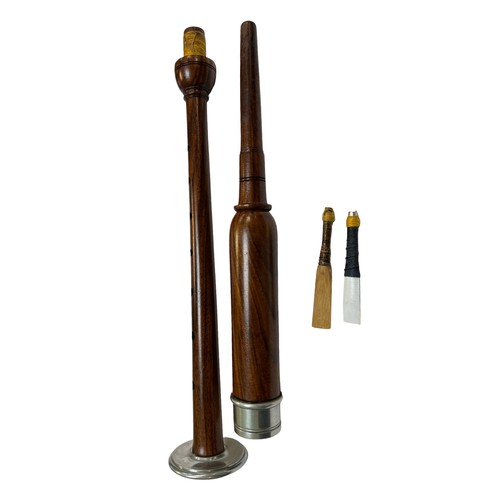 321 - Wooden and white metal bagpipe practice chanter, turned wood, with two reeds. Unsigned in box.