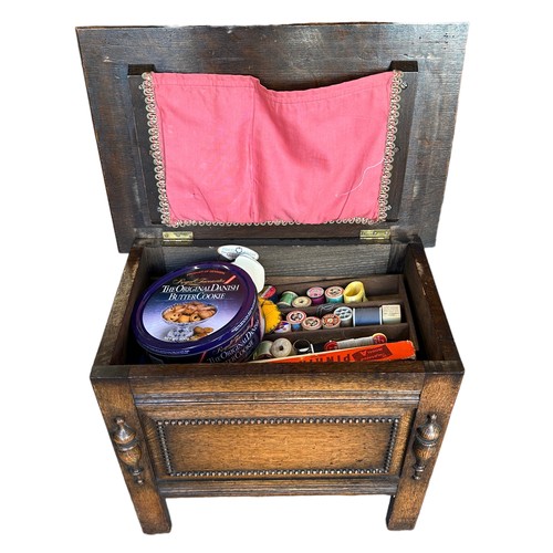 425 - Childs Oak Coffer Sewing Box comes with all the usual sewing accoutrements H 44, W 36, L 54.