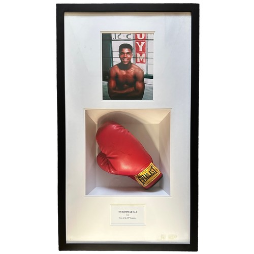 329 - A framed signed Muhammad Ali boxing glove. Muhammad Ali was an American professional boxer and activ... 