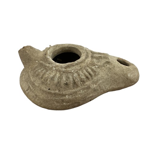 348 - Roman, Terracotta pottery Oil lamp, 3rd –  4th Century A.D. Convex body with two openings and a mini... 