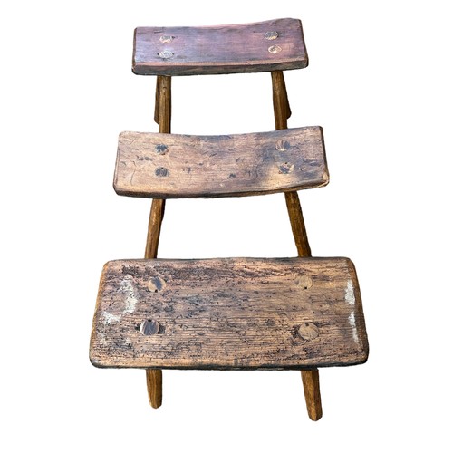 426 - A range of 3 rustic Hungarian wooden stools. W46 x H38cm, W49 x H39cm and W43 x H39cm.