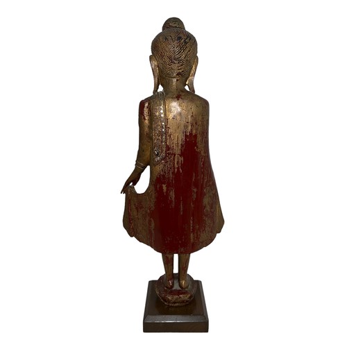 364 - Carved wooden tall standing Buddha, possibly Thai / Burmese, red lacquer and gold finish, mirror and... 