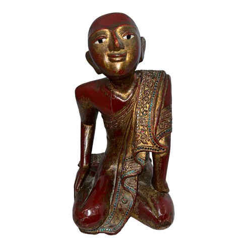 365 - Tibetan, carved wooden praying Sariputta Monk figure, red lacquer and gold finish with mirror and se... 