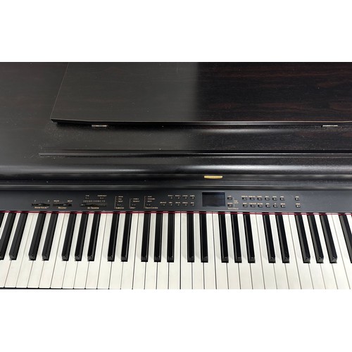 318A - A Korg Digital Piano - EC500/EC300 Concert series. Piano is in excellent condition and fully functio... 