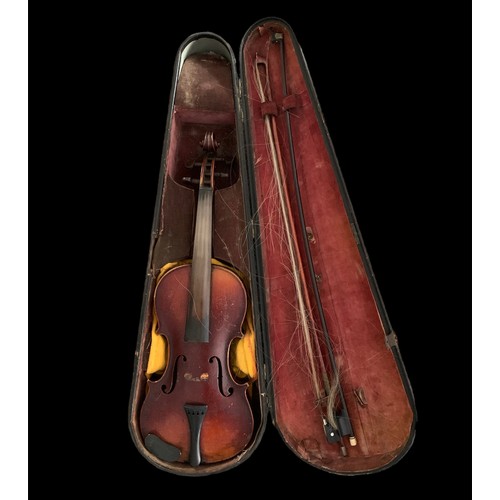 314A - 20th Century cased Maple violin, likely European, held in original case with two bows. No labels to ... 