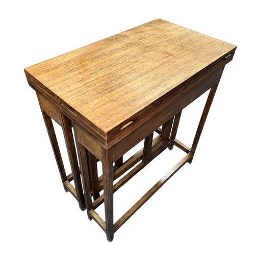 419 - An unusual mid-Century walnut metamorphic extending table. Folded 30x52.5cm, height 57cm, extended 9... 