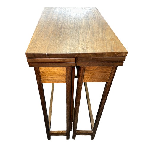 419 - An unusual mid-Century walnut metamorphic extending table. Folded 30x52.5cm, height 57cm, extended 9... 