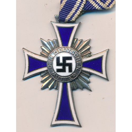 22 - Germany – Second World War silver Cross of Honour of the German Mother, with ribbon, dated 16 Decemb... 