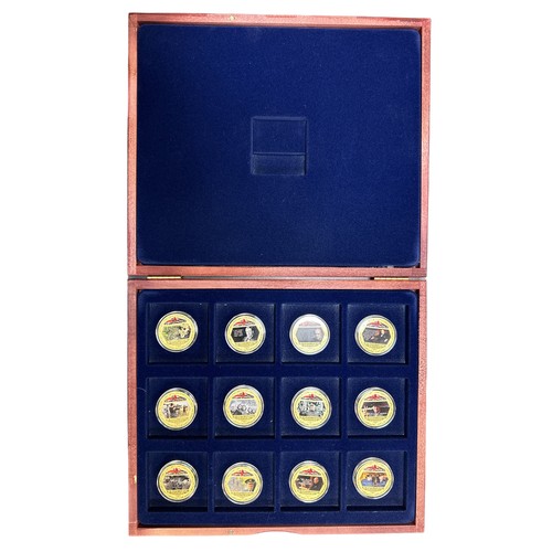 172 - Churchill set of 12 pictorial gold plated medallions, in wooden presentation case.