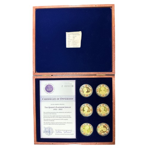 174 - The Queen's Platinum Jubilee 2022 set of 6 gold plated medals, in a wooden presentation case with ce... 