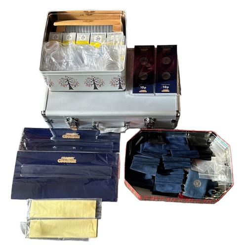 291 - A range of coin collecting accessories with a metal carry case with inner trays, box of plastic caps... 