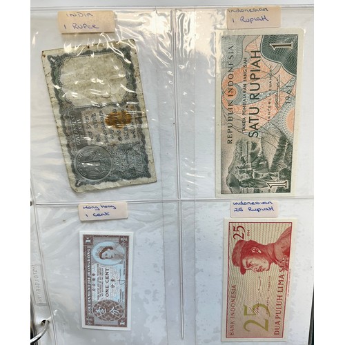 295 - World banknotes (64), in an album, in mixed condition with examples from China, Greece, GB, Ireland,... 