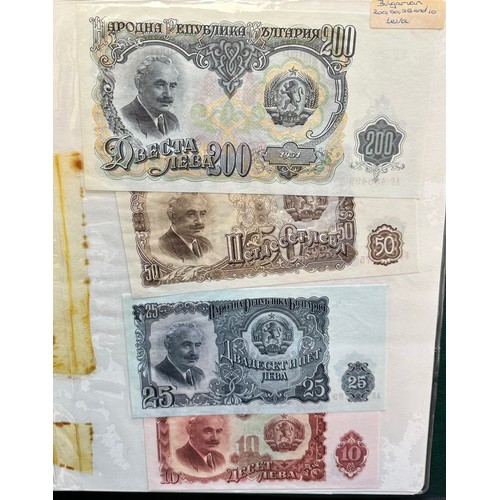 295 - World banknotes (64), in an album, in mixed condition with examples from China, Greece, GB, Ireland,... 