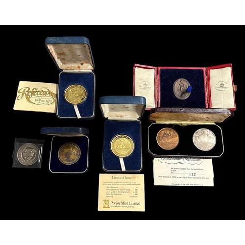 186 - Collection of commemorative medals with cased Cunard Queen Elizabeth final voyage silver and bronze ... 