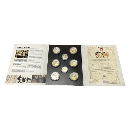 267 - In Flanders Fields Museum Official medal set of 8 in presentation folder, including 9ct gold medal, ... 