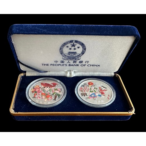 272 - China – The Peoples Bank of China 10 Yuan Greeting of Spring silver 1oz coloured coin pair. With cer... 