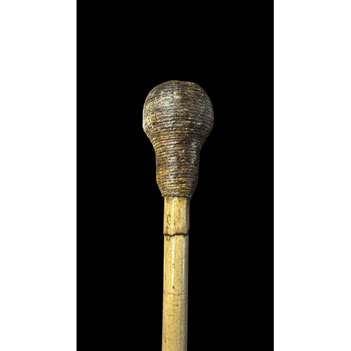 118 - Late 19th / early 20th century Bosun’s cosh, bone handle, twisted rope weighted ends. Length 23cm.