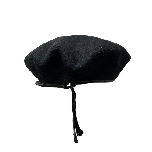 85 - Belgium, Black / Navy military beret with Omnia Conjungo cap badge to front. Marked to interior for ... 