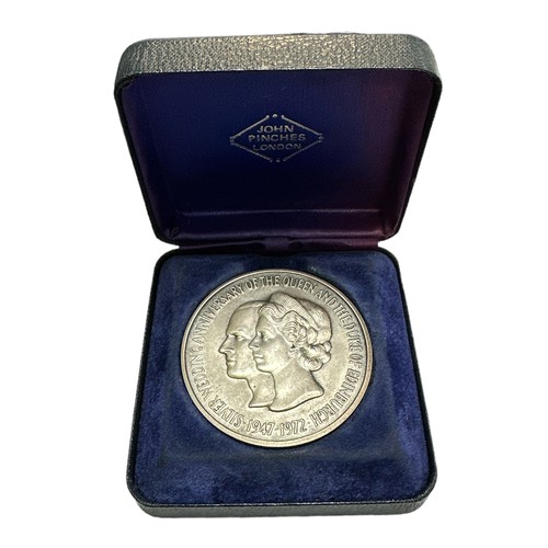 165 - 1972 The Queen's 25th Wedding Anniversary 51mm silver medal, in John Pinches case of issue. 62g.