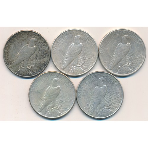 287 - USA range of silver dollars (5), in mixed condition with 1928, 1934 (2) and 1935 (2).