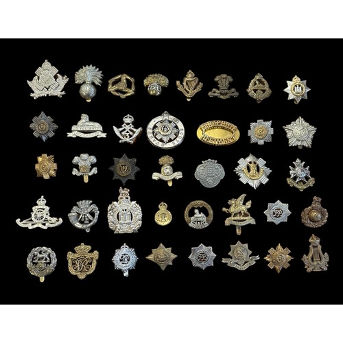 94 - Mixed lot of military cap badges etc (53), with examples of The Royal Scots, Brecknockshire, Notts &... 