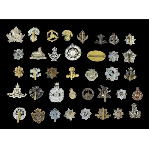 94 - Mixed lot of military cap badges etc (53), with examples of The Royal Scots, Brecknockshire, Notts &... 