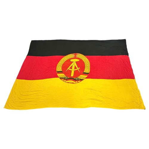 71 - East Germany, extremely large East Germany fabric flag, stitched design with attached round insignia... 