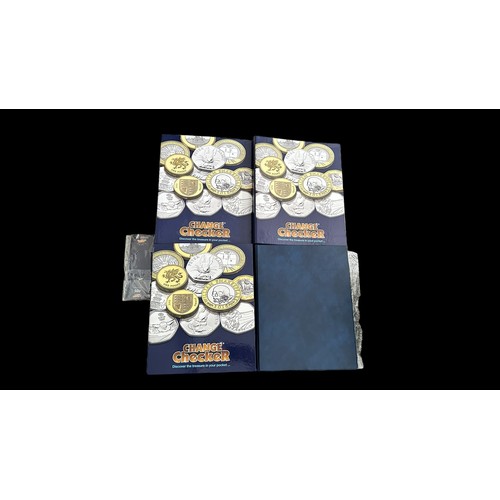 240 - Change Checker collection modern coin collection, in 4 albums, mostly uncirculated on change checker... 