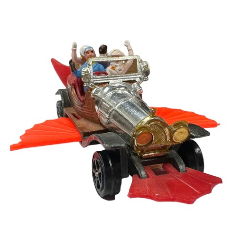 46 - Corgi Juniors uncarded Chitty Chitty Bang Bang No. 1006, bright orange pull-out wings, seated figure... 