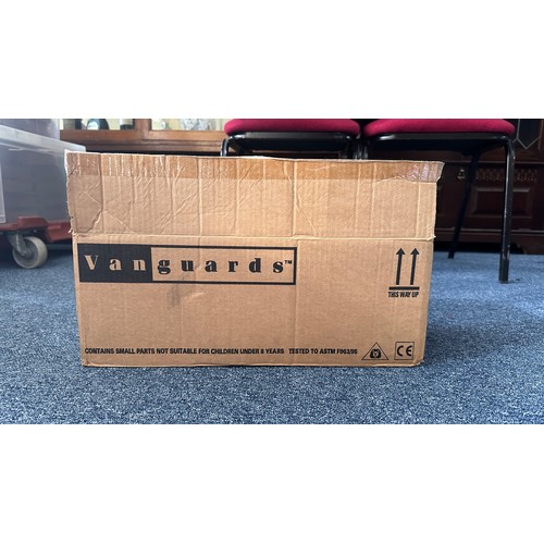 142 - Vanguards Trade box of 18 Vanguard 1/64th to 1/43rd scale models, generally mint to excellent in goo... 