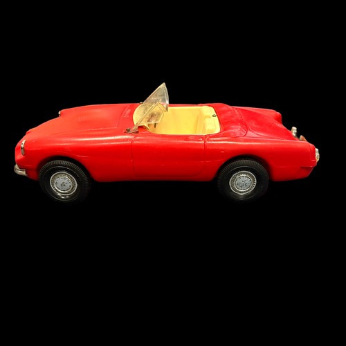 278 - Sindy 1960s MGB red convertible car, generally excellent except deformed plastic windscreen. Content... 