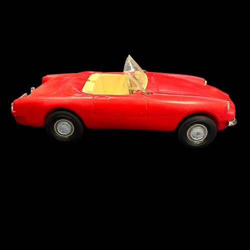 278 - Sindy 1960s MGB red convertible car, generally excellent except deformed plastic windscreen. Content... 