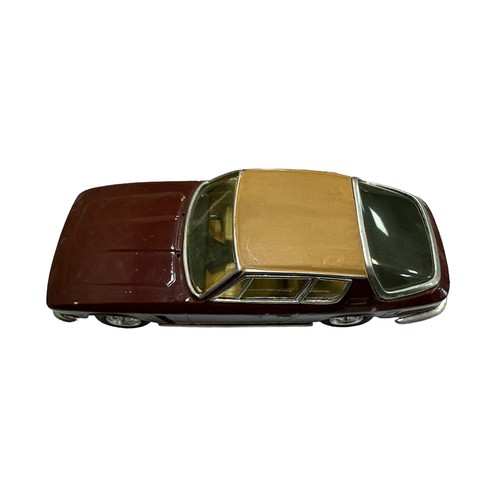 77 - Enco Models Jensen Interceptor maroon with tan roof  1/43rd scale white metal model, generally excel... 