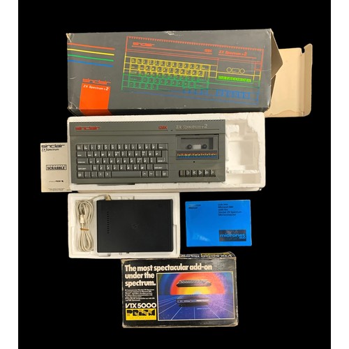 244 - Spectrum Sinclair, boxed Sinclair ZX Spectrum +2, with accessories including, boxed VTX 5000 Prism M... 