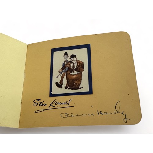 315 - Two vintage autograph books containing several autographs, mainly of stars of the entertainment worl... 