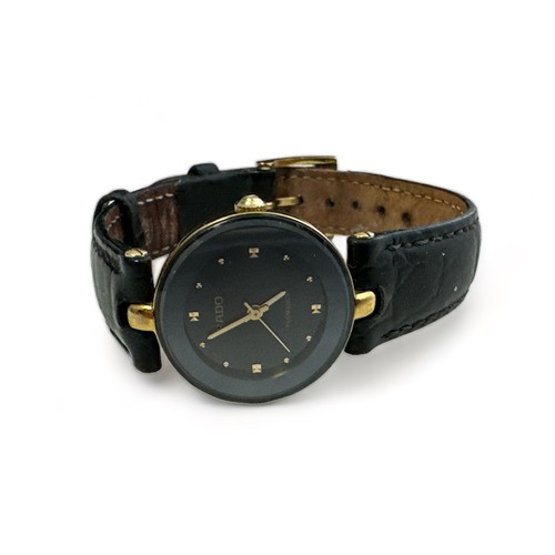 74 - Rado Switzerland, a Rado Florence black faced ladies wristwatch, circular dial with leather strap an... 