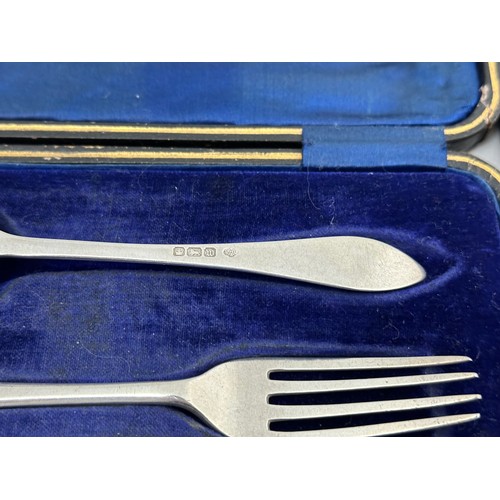 108 - A silver fork and spoon set by William Hutton & Sons Ltd , Sheffield 1904. Together with a cased set... 