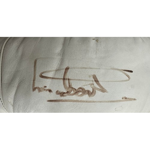 409 - Chris Eubank (British, b.1966), pair of signed white Lonsdale boxing gloves, signed by boxing legend... 