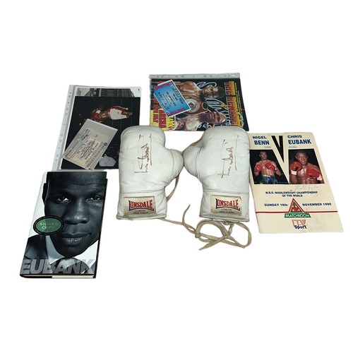 409 - Chris Eubank (British, b.1966), pair of signed white Lonsdale boxing gloves, signed by boxing legend... 