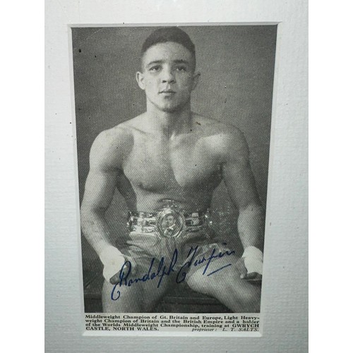 411 - Randolph Turpin (British, 1928-1966), framed pair of leather boxing gloves worn by Randolph Turpin i... 