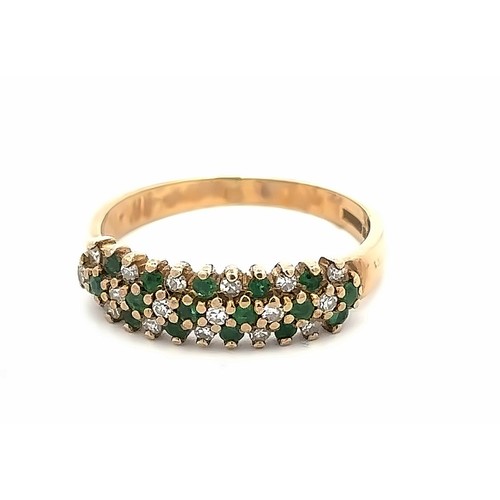 36 - A 9ct gold three row emerald and diamond ring. Full hallmarks. Size ?  Weight 2g.

Please see the bu... 