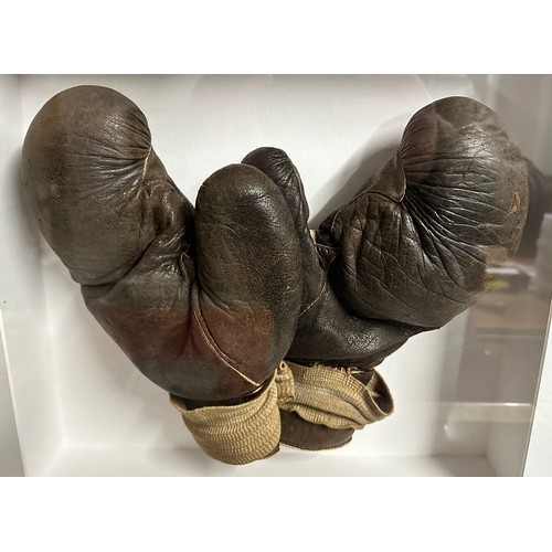 410 - Bruce Woodcock (British, 1920-1977), framed pair of leather boxing gloves worn by Bruce Woodcock in ... 