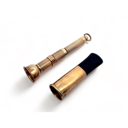 290 - A 9ct gold cigar piercer and cigar holder, both by S. J. Rose & Son, 1966.  Total weight 20g.