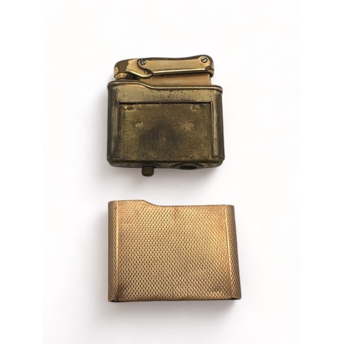 291 - A Calibri Monogas lighter in a 9ct gold engine turned case . Calibri stamp and hallmarks to base. To... 