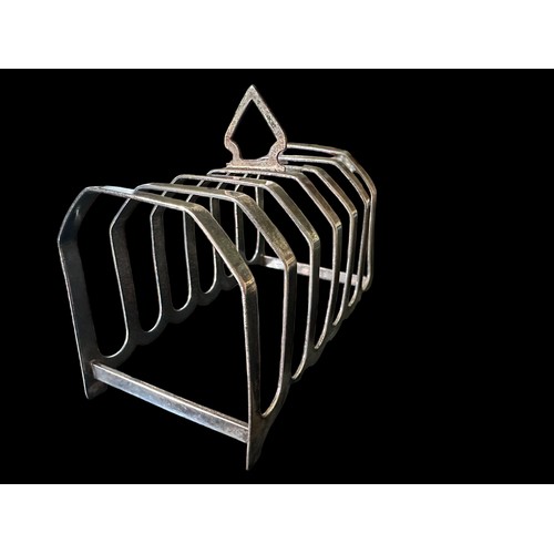 116 - A silver six slice toast rack by J. Collyer, Birmingham 1938.